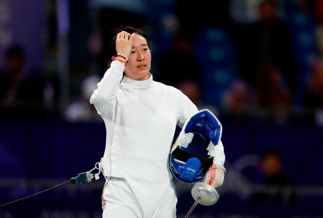 九游APP中心-女子重剑首轮孙一文加时告负，首轮出局无缘卫冕